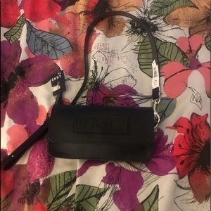 Black DKNY fanny pack/mini purse.